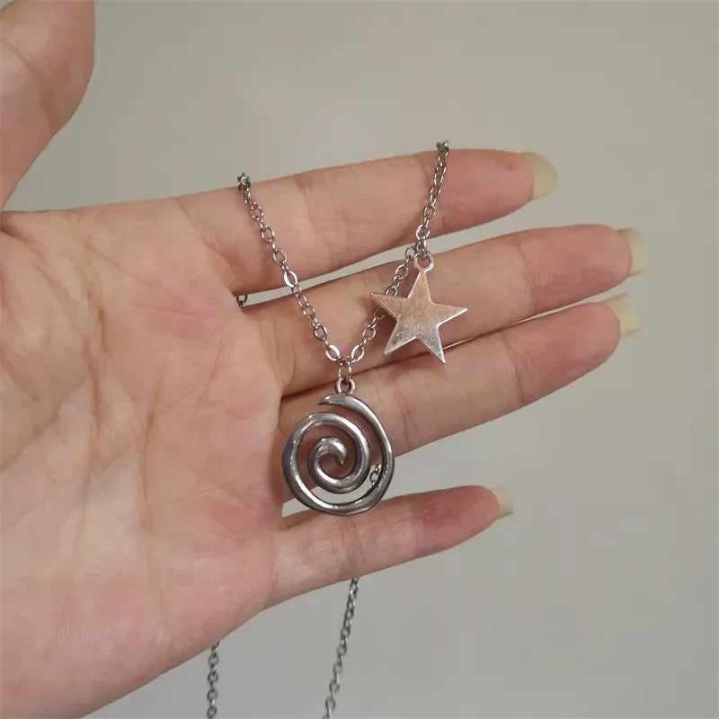 Ketting met spiraalhanger en kleine ster
