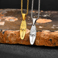 Ketting met kleine palm- en zeehanger in goud