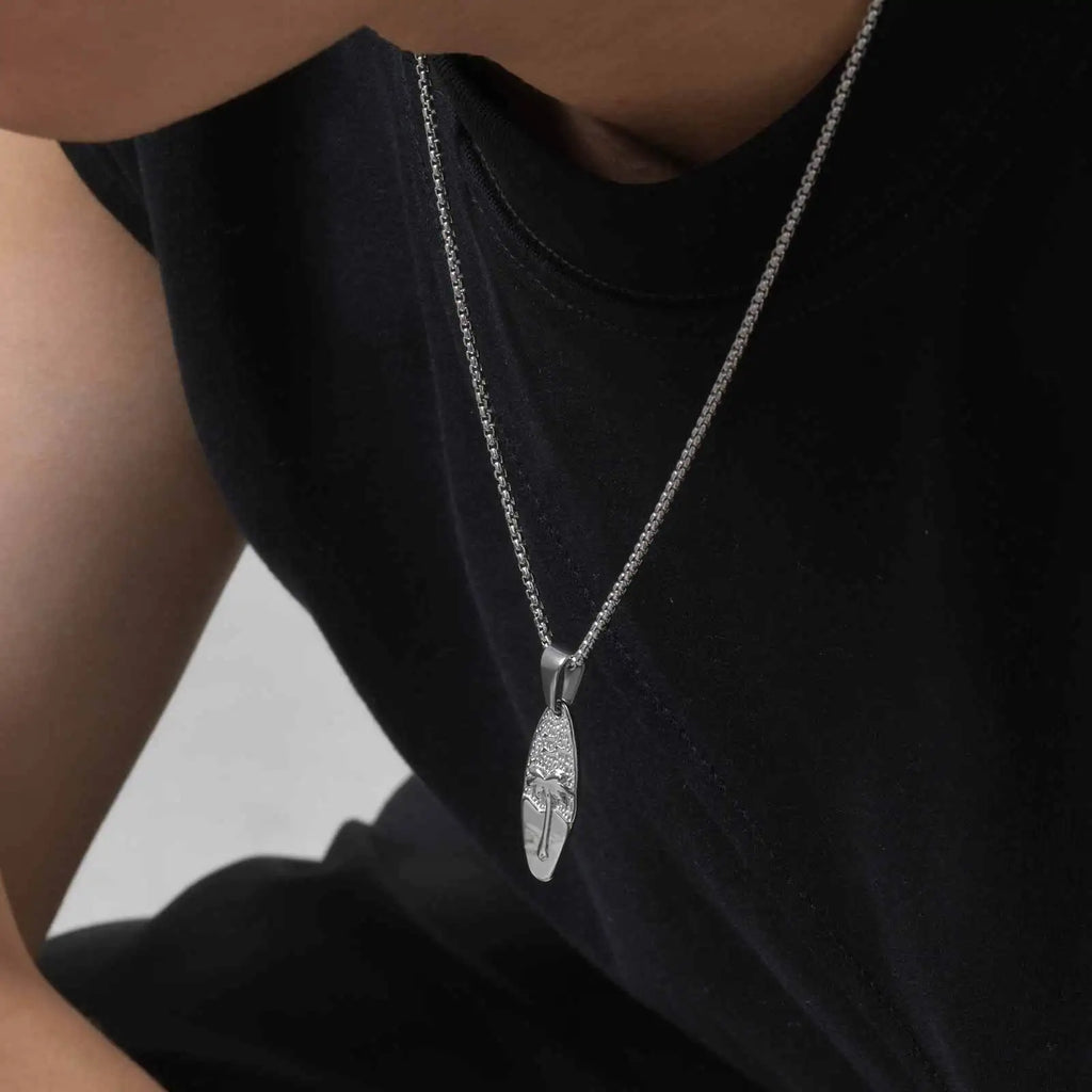 Ketting met kleine palm- en zeehanger in zilver
