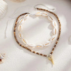 Set van 2 boho halskettingen met schelpen en witte haaientand hanger
