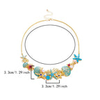 Goudkleurige en blauwachtige schelpketting