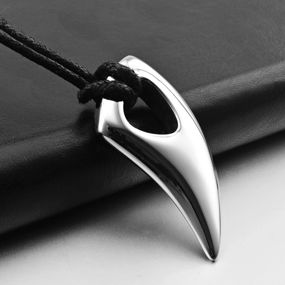 Koordketting met zilveren haaientand hanger