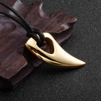 Koordketting met gouden haaientand hanger