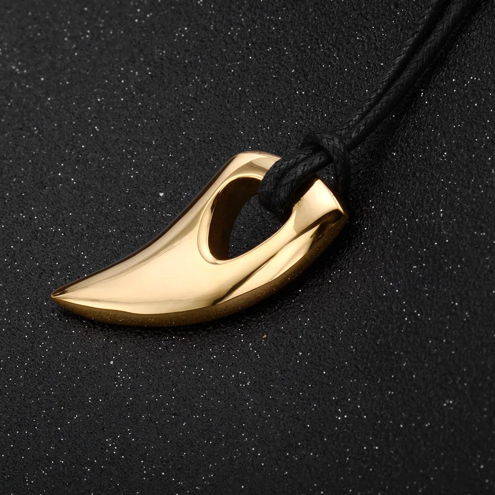 Koordketting met gouden haaientand hanger