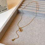 Lariatketting met zonster-hangers en tijgeroogstenen