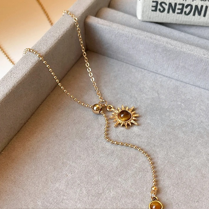 Lariatketting met zonster-hangers en tijgeroogstenen
