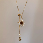 Gouden lariatketting met zonster-hangers en tijgeroogstenen