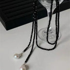 Collier de Charme avec Pendentif perles noir