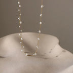 Dubbele rij ketting met parelhanger