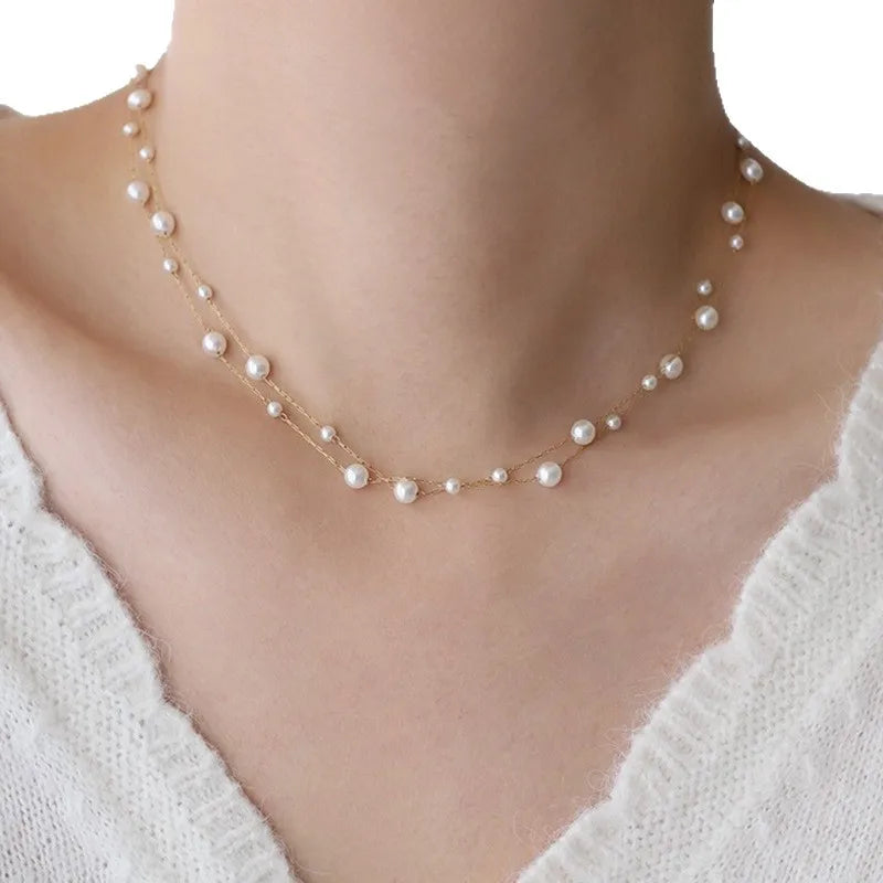Dubbele rij ketting met parelhanger