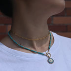 Ketting met gekleurde kralen en beschermende hanger blauw oog blauw oog rond