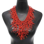 Ketting en borstplaat-hanger koraal rood