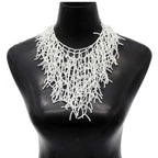 Ketting en borstplaat-hanger koraal wit