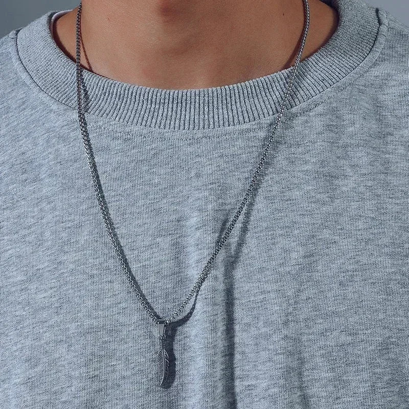 Zilveren ketting met veerhanger