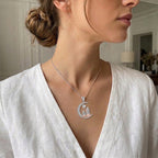 Ketting en zijn hanger "moeder en haar dochter" 