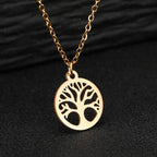 Fijne ketting met ronde opengewerkte levensboom-hanger goud