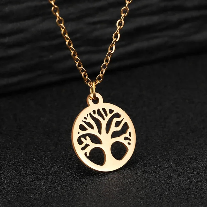 Fijne ketting met ronde opengewerkte levensboom-hanger goud