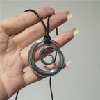 Lange ketting met zilverkleurige spiraalhanger