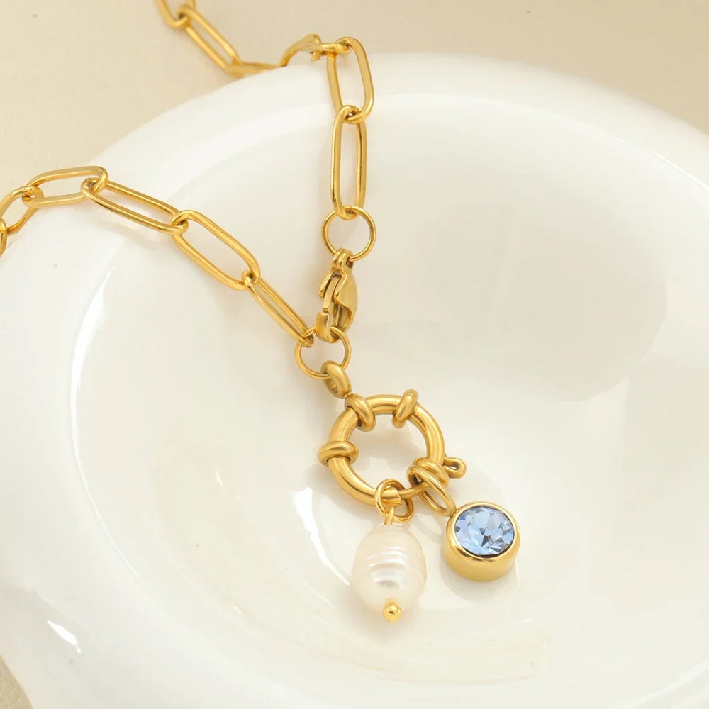 Schakelketting met parelhanger en geboortesteen april