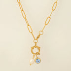 Schakelketting met parelhanger en geboortesteen april