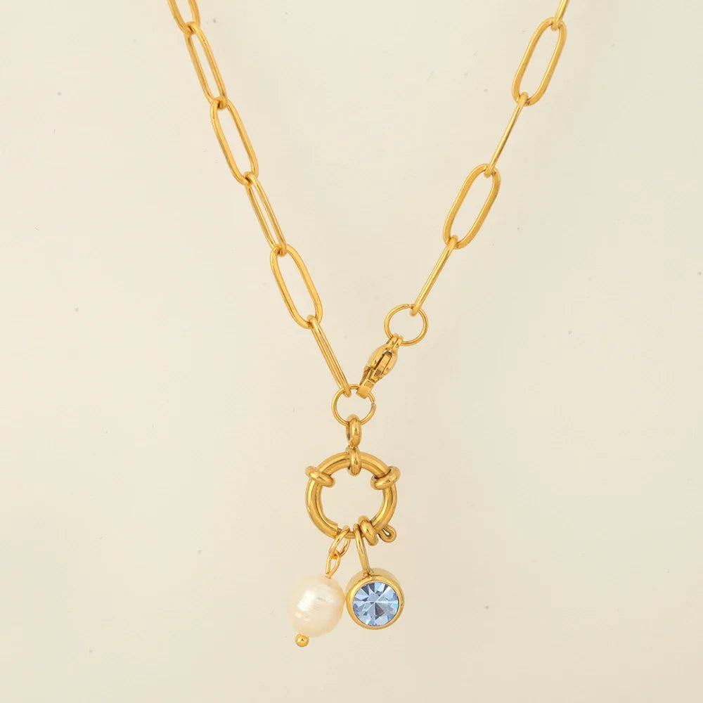 Schakelketting met parelhanger en geboortesteen april