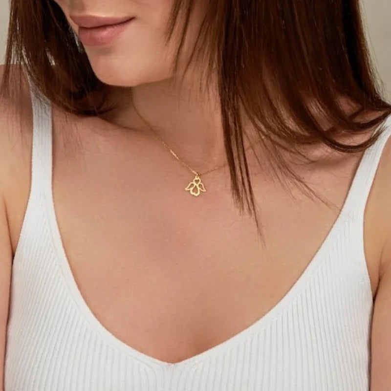 Damesketting met engelenvleugelhanger goud