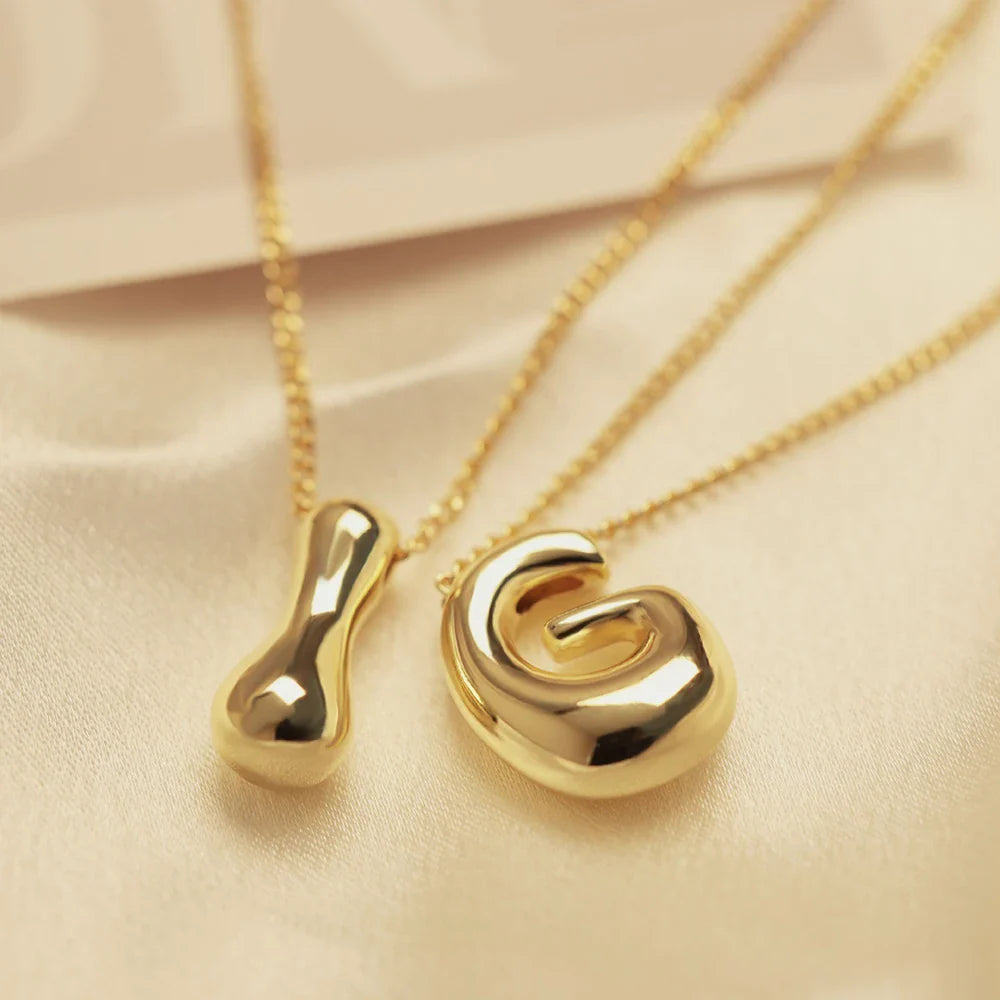 Damesketting met initiaalhanger g