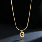 Dames chokerketting met initiaalhanger g