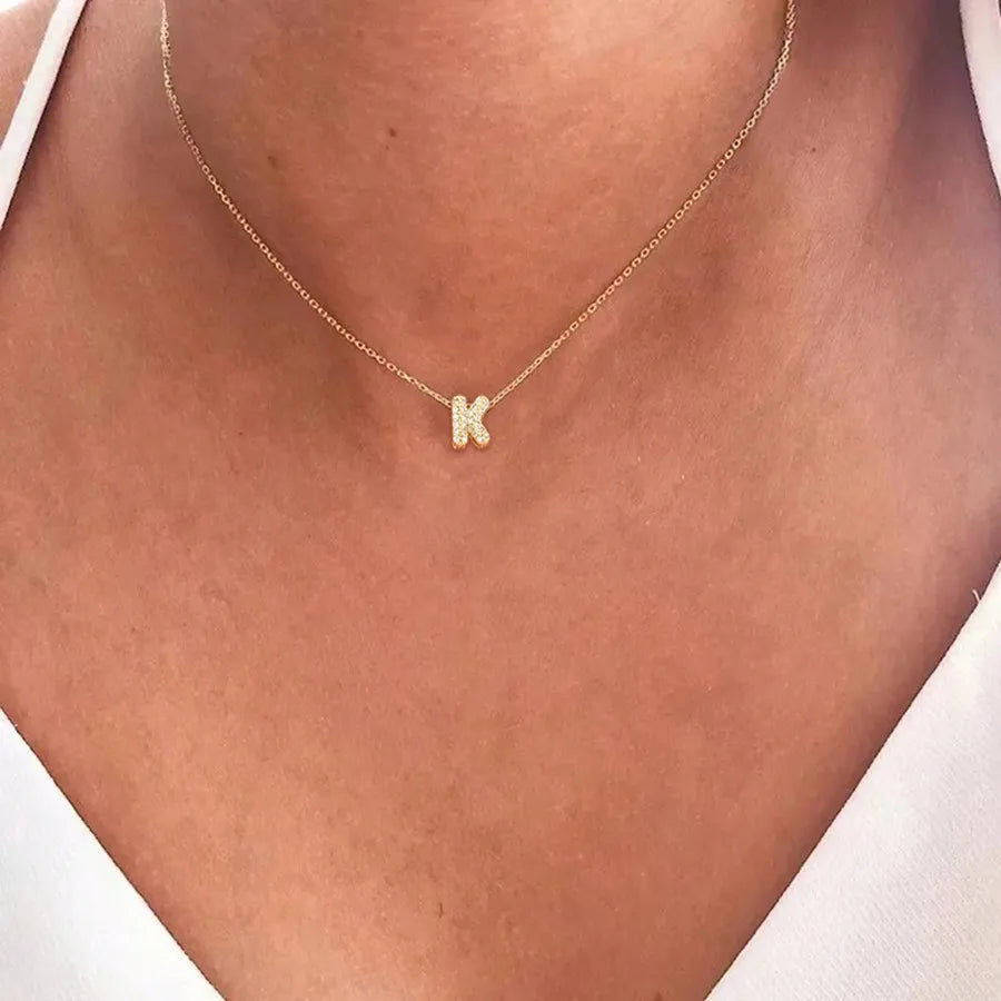 Dames chokerketting met minimalistische initiaalhanger k