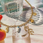 Collier Ras de Cou avec Pendentifs Corail et Coquillages Femme