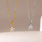 Zilveren choker met sterhanger bezet met zirkonia