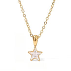 Gouden choker met sterhanger bezet met zirkonia