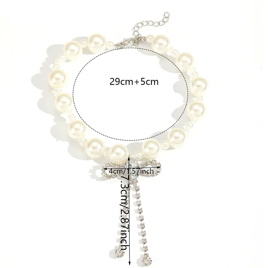 Choker ketting met vlinderstrikje-hanger van strass