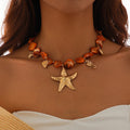 Collier Ras de Cou avec Pendentifs Coquillages Etoile de Mer orange