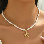 Korte ketting met schelp en zeester, wit, fijne kralen