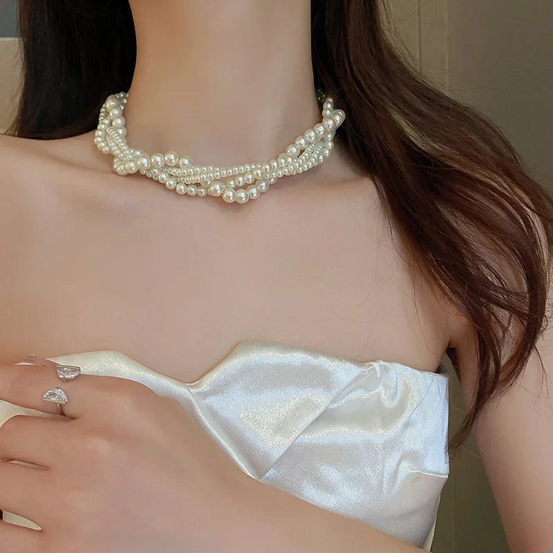 Gedraaide ketting met parelhanger