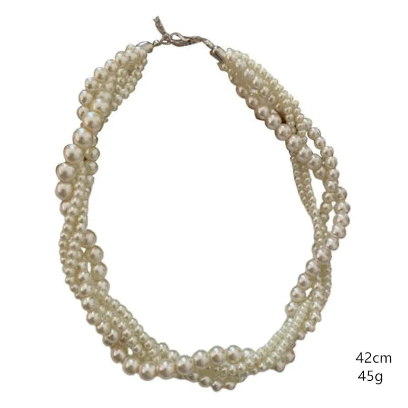 Gedraaide ketting met parelhanger