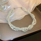Gedraaide ketting met parelhanger