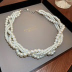 Gedraaide ketting met parelhanger