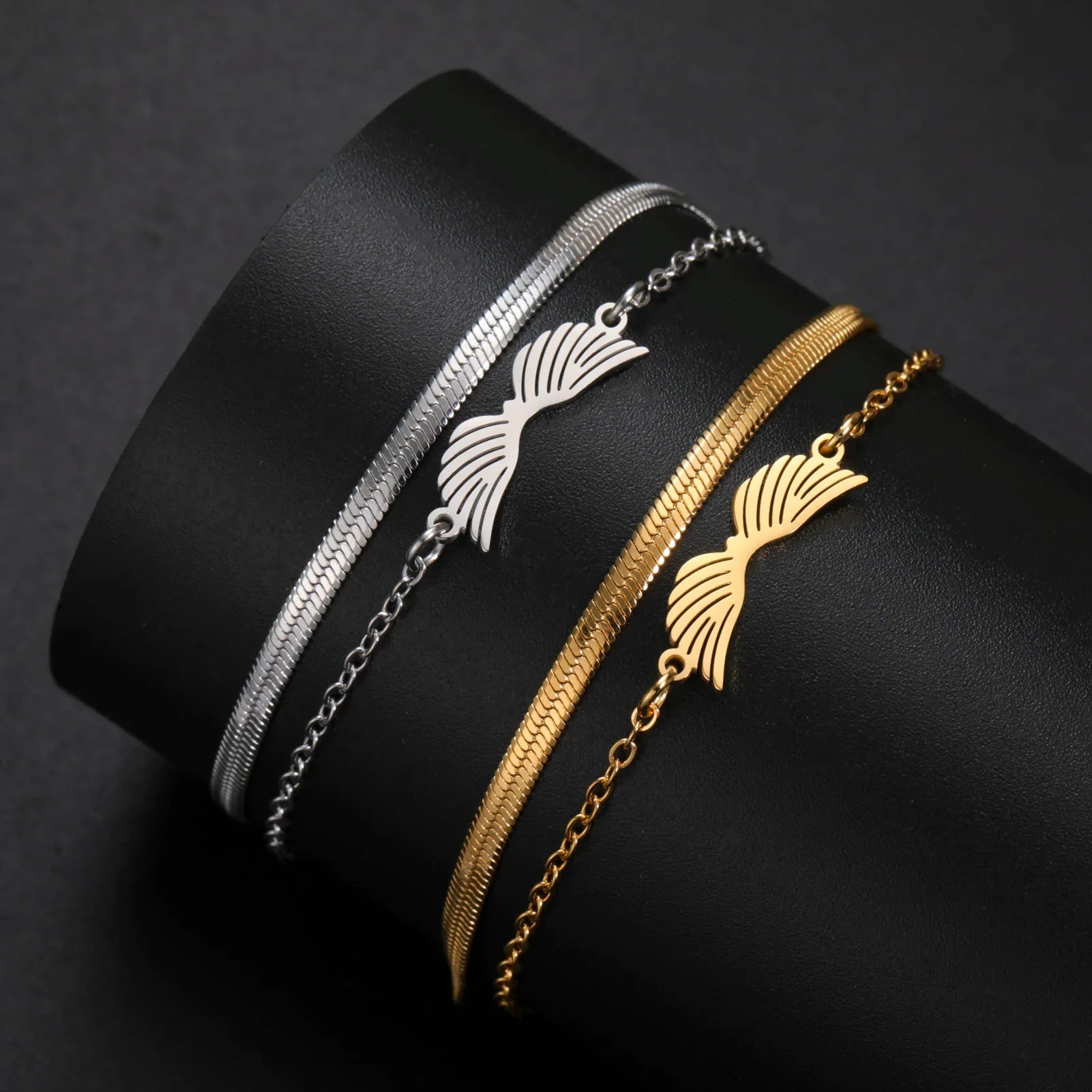 Dubbele engelenvleugels armband goud