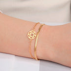 Dubbele armband met de <span data-glossary-id="etoile-de-david">Davidster</span> joods symbool goud