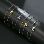 Dubbele initiaal armband goud en zilver