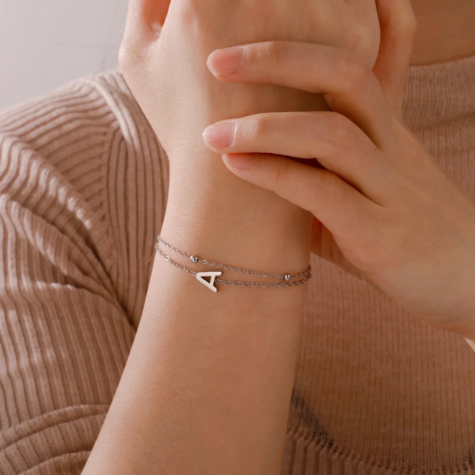 Dubbele initiaal armband goud en zilver 