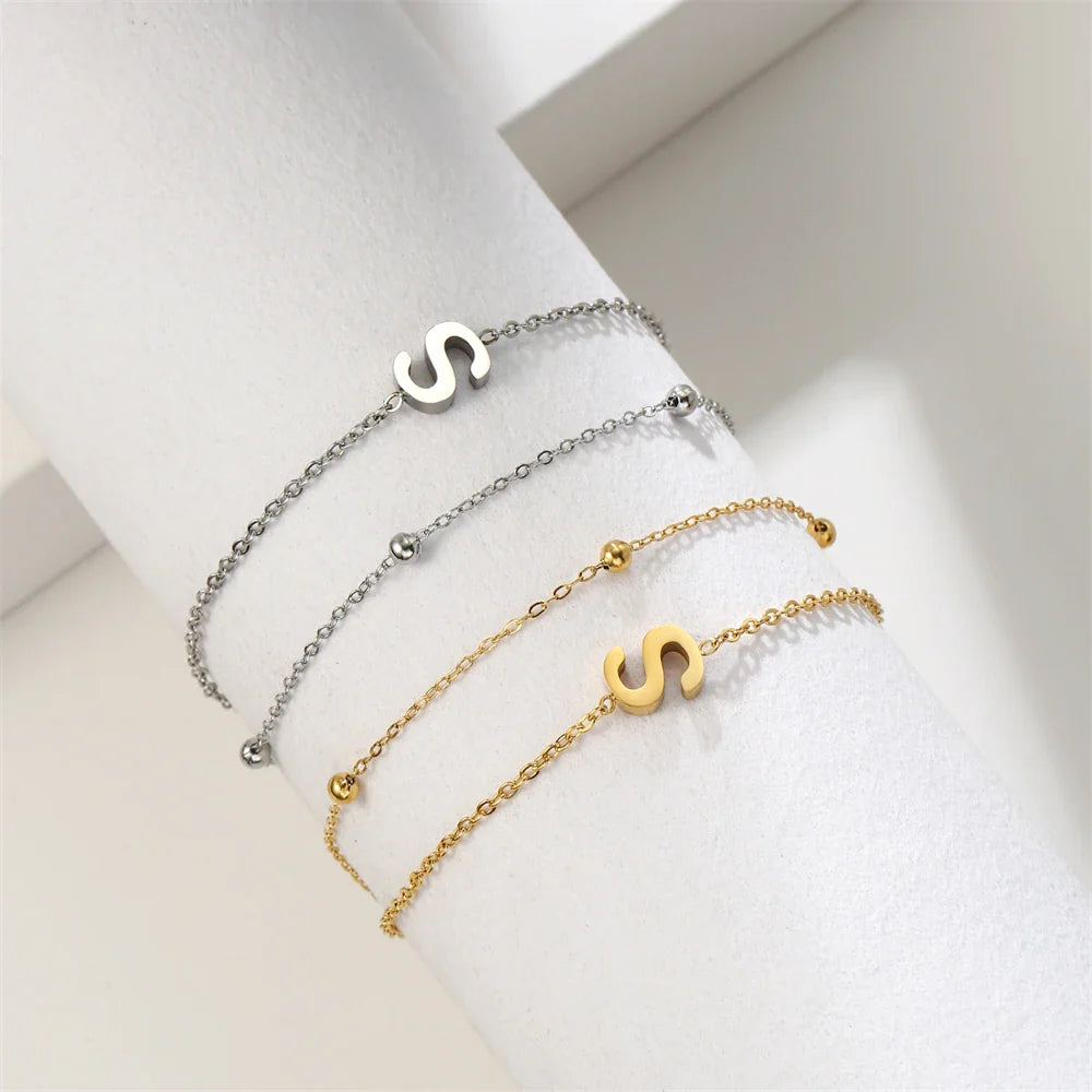 Dubbele initiaal armband goud en zilver  s