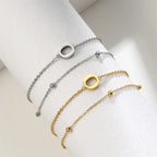 Dubbele initiaal armband goud en zilver  o