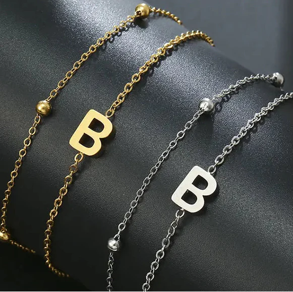 Dubbele initiaal armband goud en zilver  b