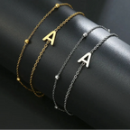 Dubbele initiaal armband goud en zilver a