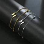 Dubbele initiaal armband goud en zilver  h