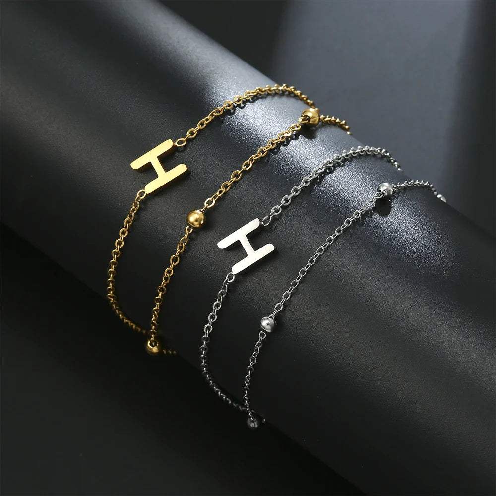 Dubbele initiaal armband goud en zilver  h