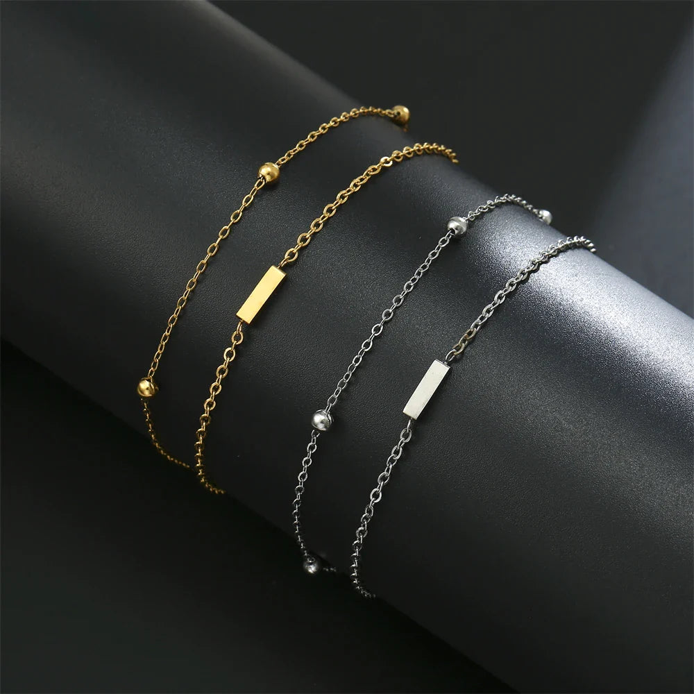 Dubbele initiaal armband goud en zilver  i